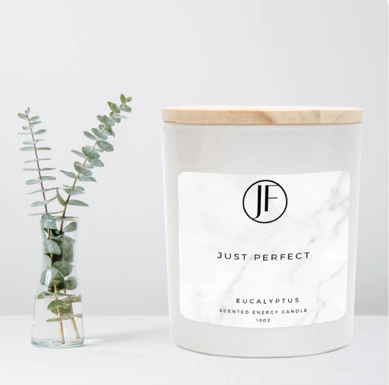A hand-poured soy-wax eucalyptus essential oil scented vegan candle.