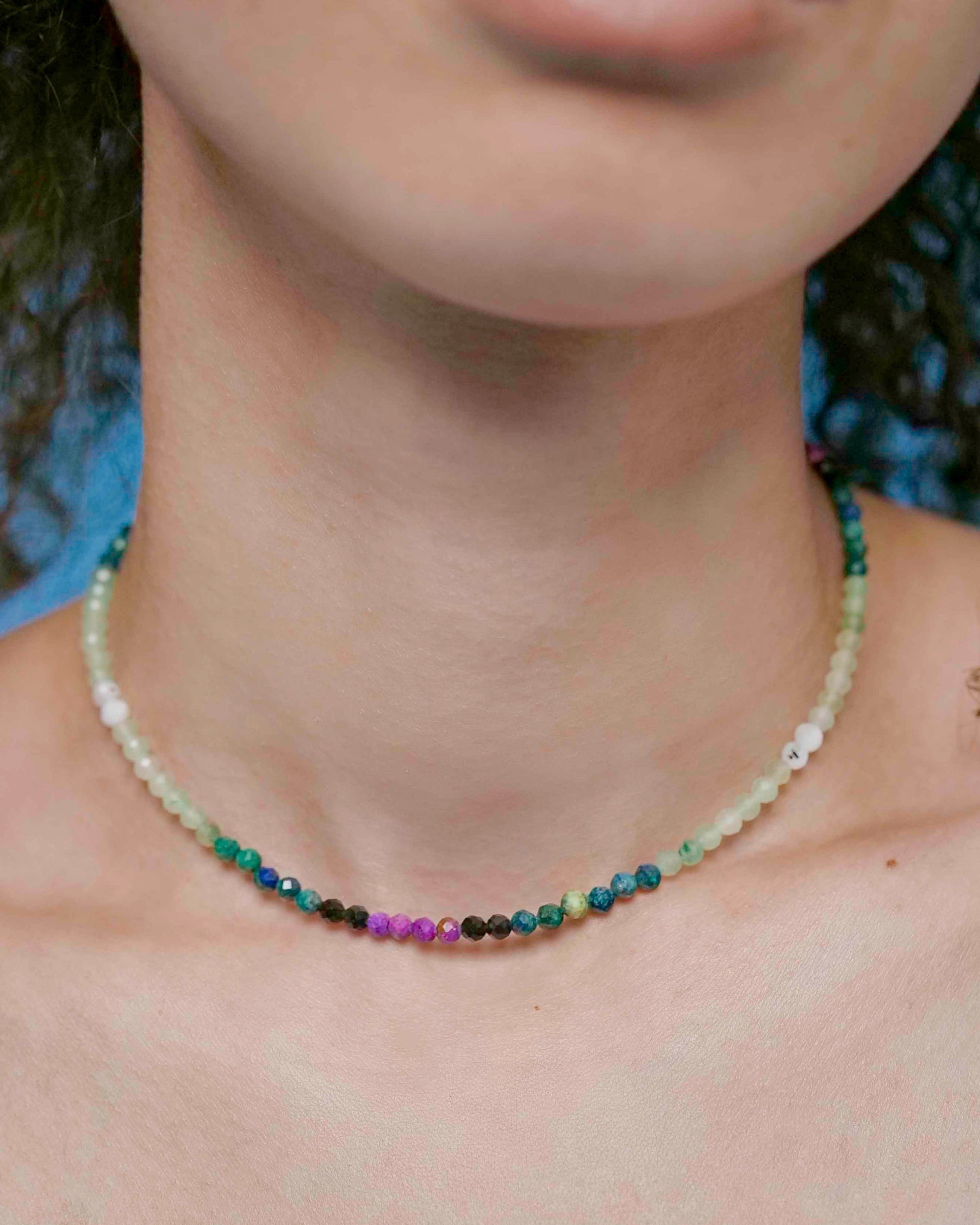Handmade beaded green and purple mixed gemstone necklace with a sterling silver clasp.
