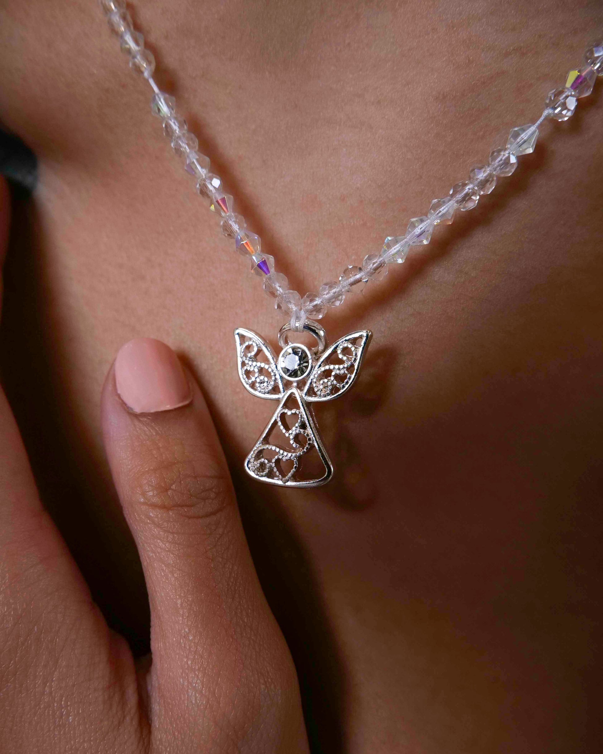 Handmade clear crystal beaded necklace with angel charm.