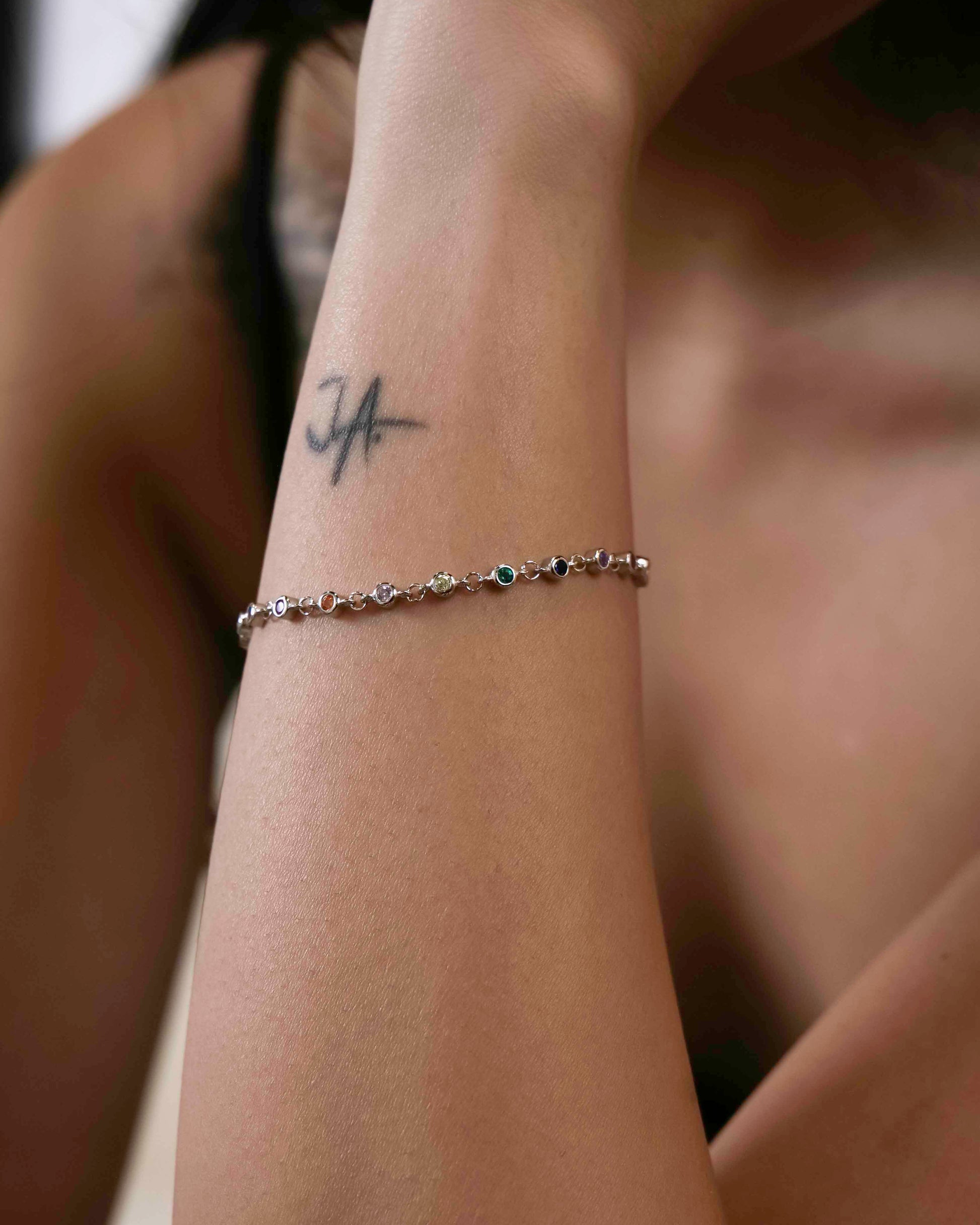 925 sterling silver zirconia charm chain bracelet.