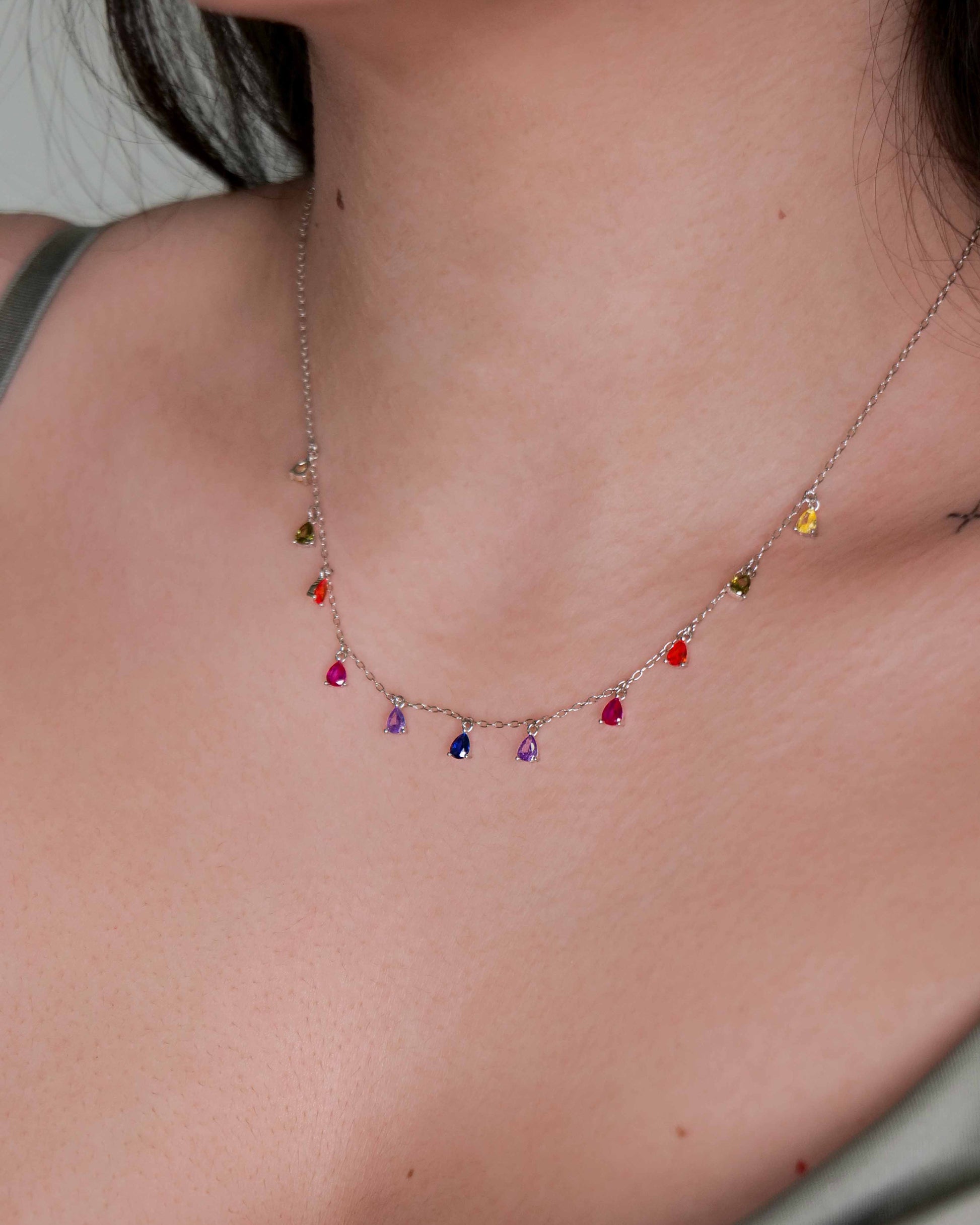 925 sterling silver chain necklace with multicolored zirconia stones.