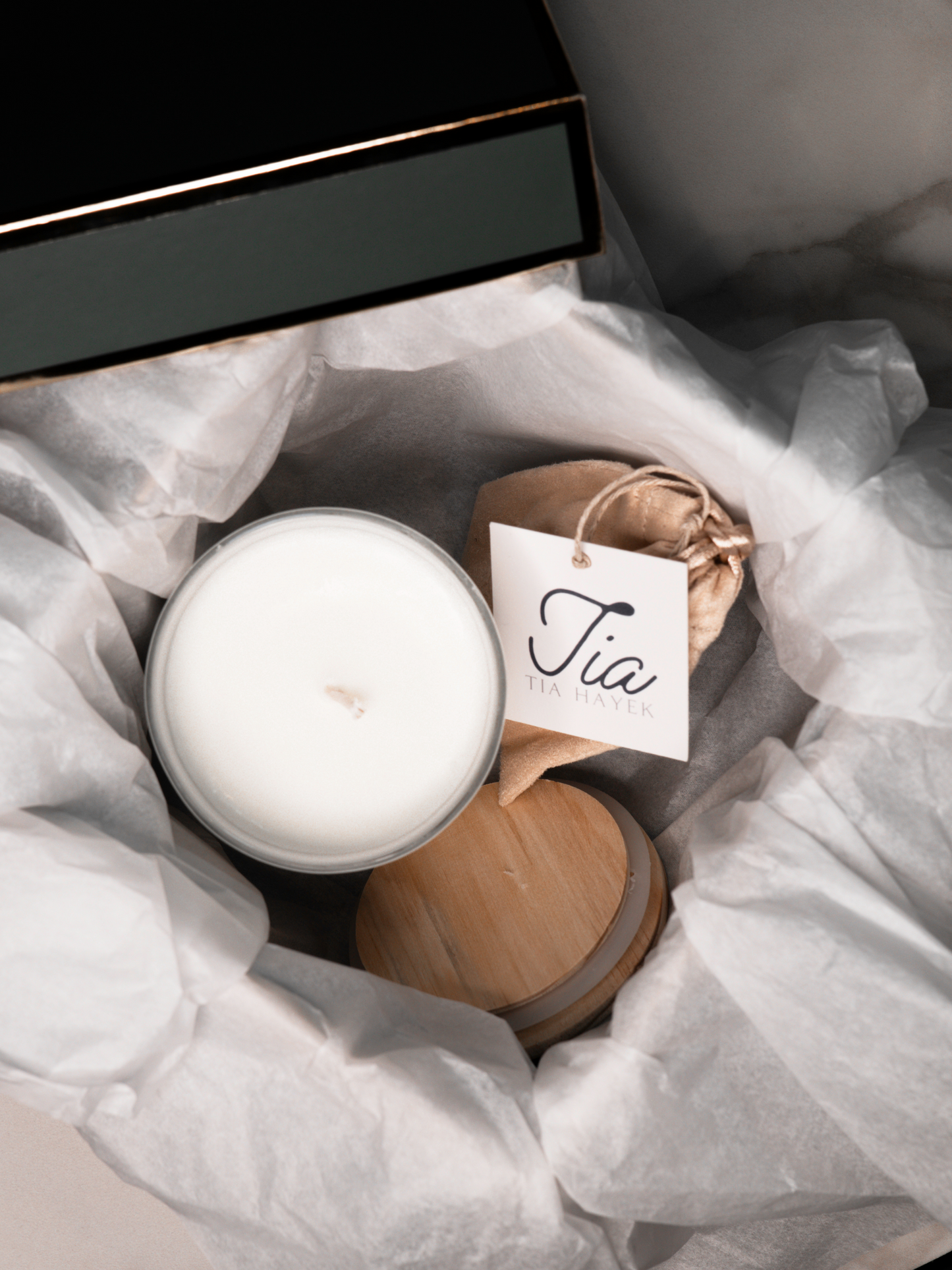 Holiday Gift Box includes a gold-plated sterling silver zirconia stone chain necklace, and a hand-poured soy-wax eucalyptus essential oil scented candle.