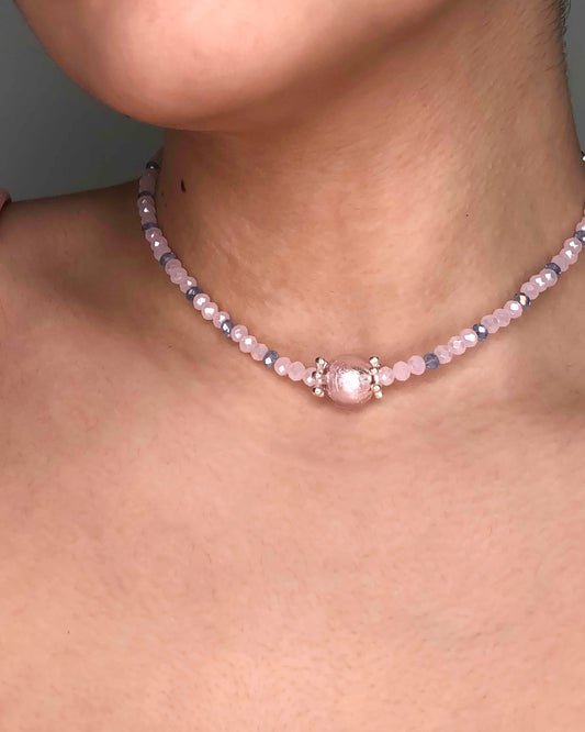 handcrafted pink and blue crystal beaded necklace with paper mache charm.