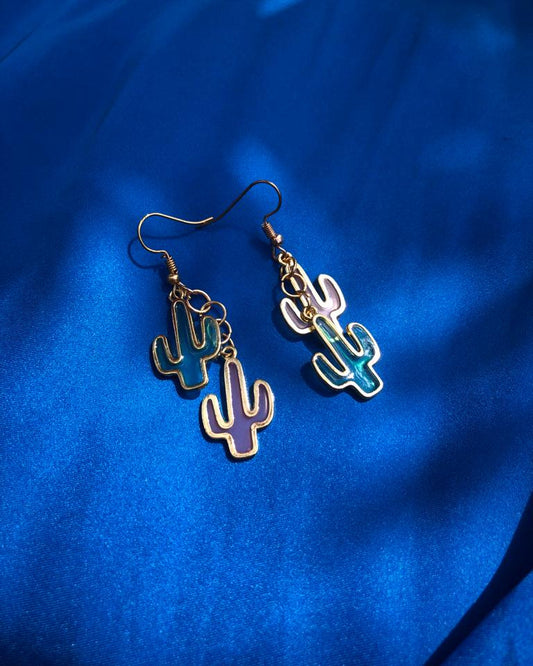 Handcrafted golden chain link earrings with pink and blue cacti charms