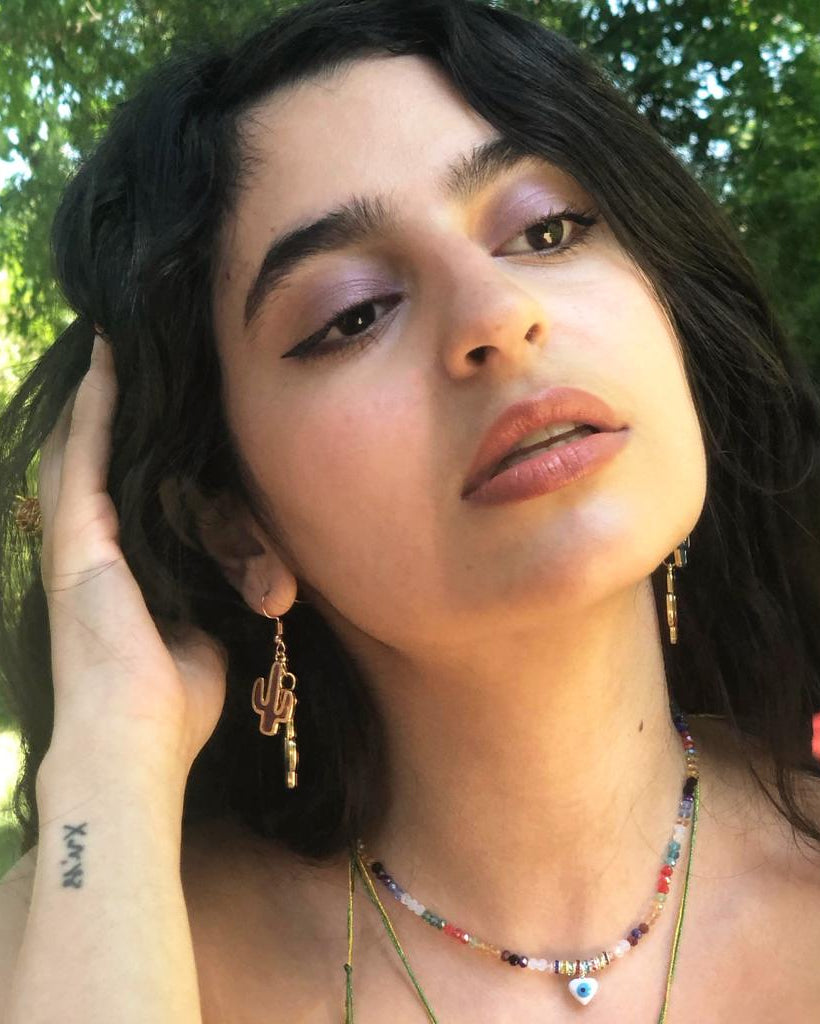 Handcrafted golden chain link earrings with pink and blue cacti charms