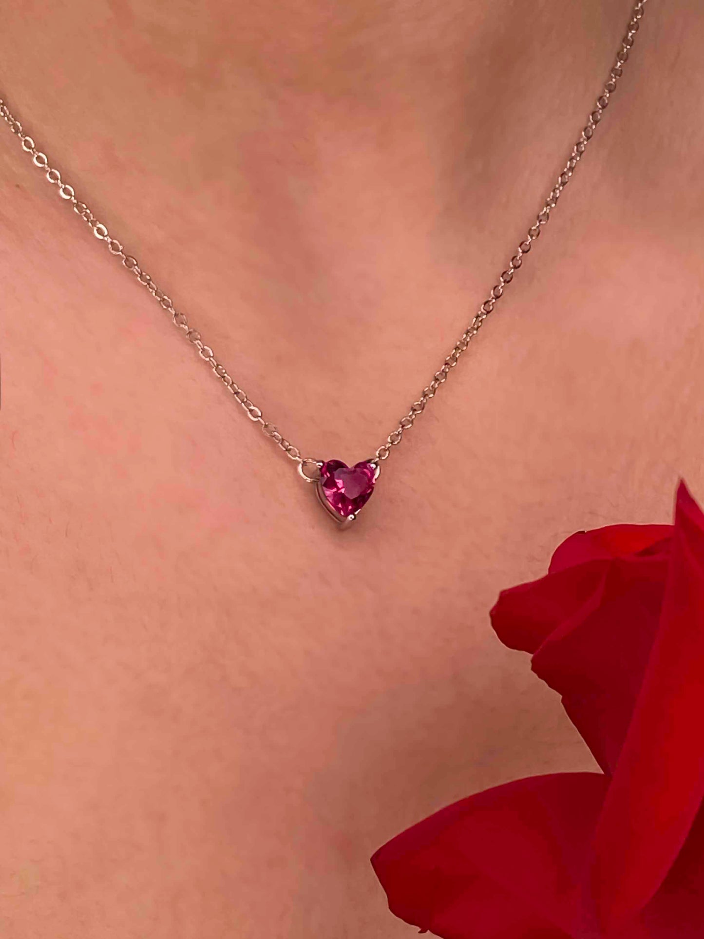 925 sterling silver chain necklace with a heart shaped rubellite gemstone.