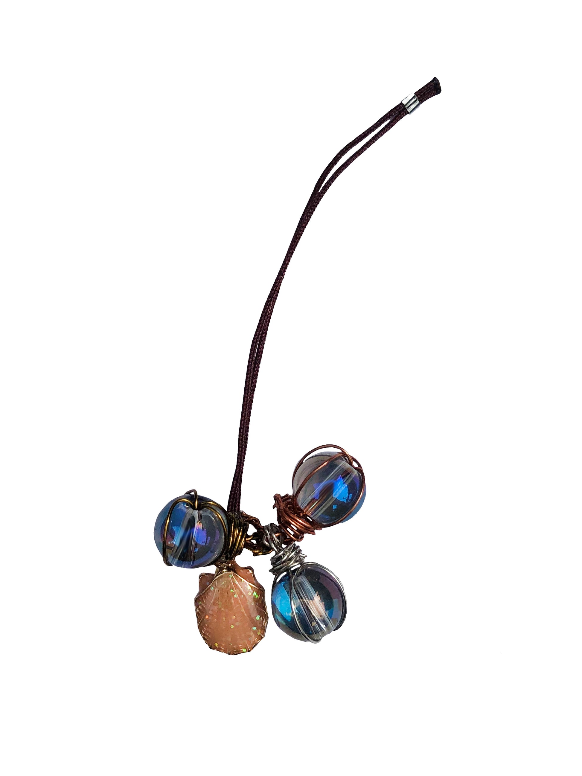 handmade phone charm with three wire wrapped glass beads and a sea shell charm.