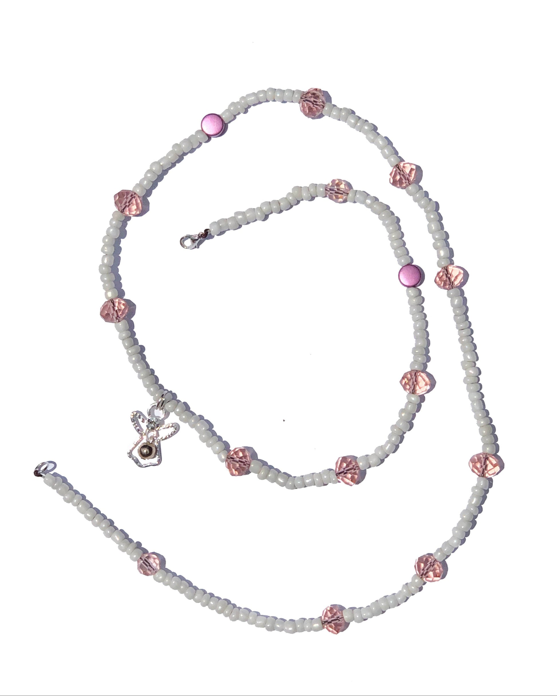 White glass beads with large light pink crystal and circle beads, handcrafted into a belly chain with silver angel charm