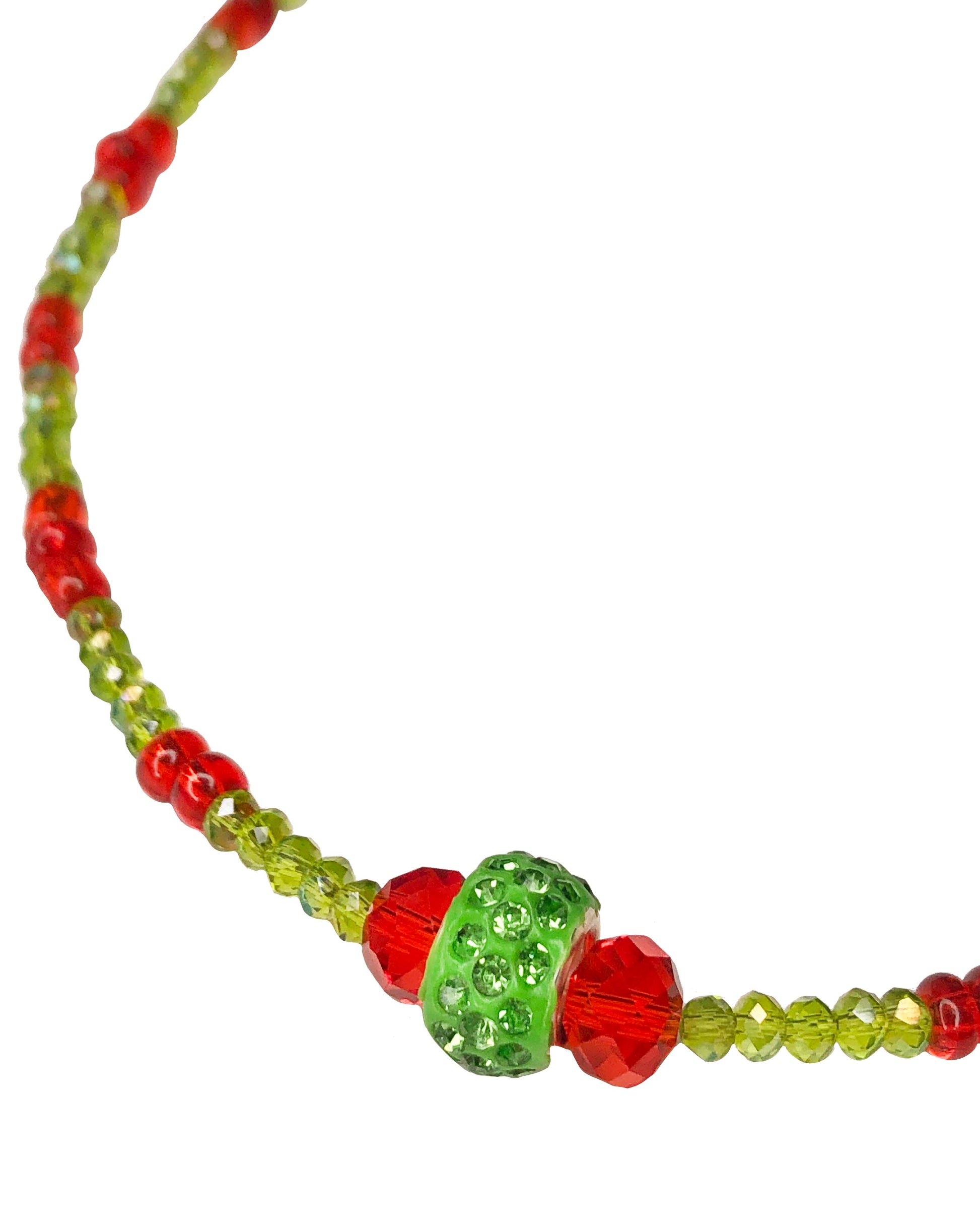 Handcrafted red and green crystal beaded necklace with rhinestone charm at its center.