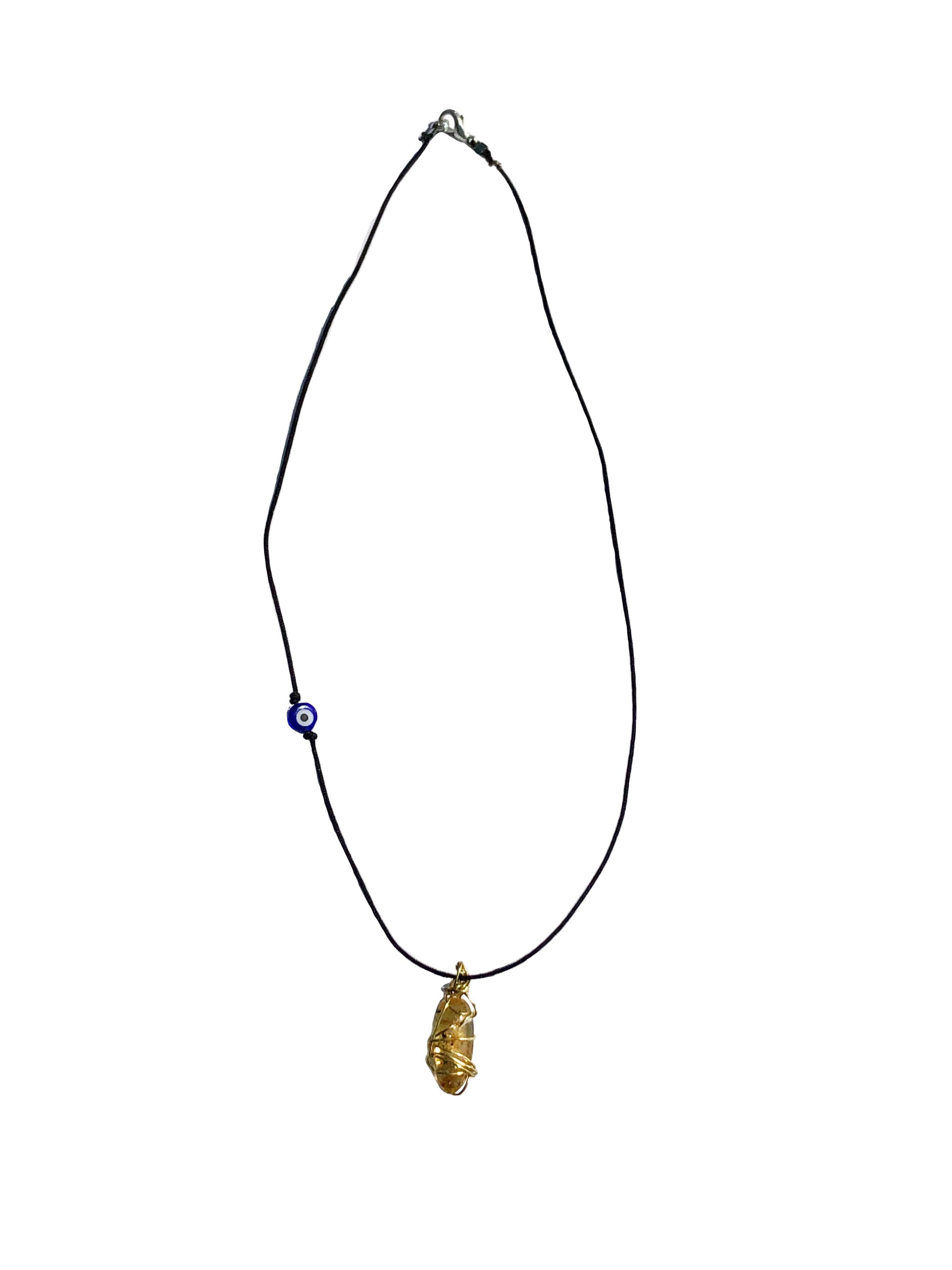 yellow tourmaline golden wire wrapped necklace with evil eye charm.