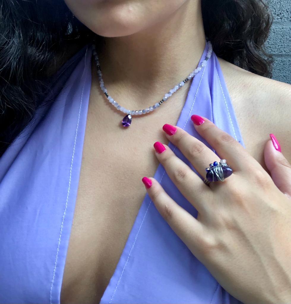 handmade blue and clear crystal beaded silver wire wrapped ring with a tourmaline centerpiece.