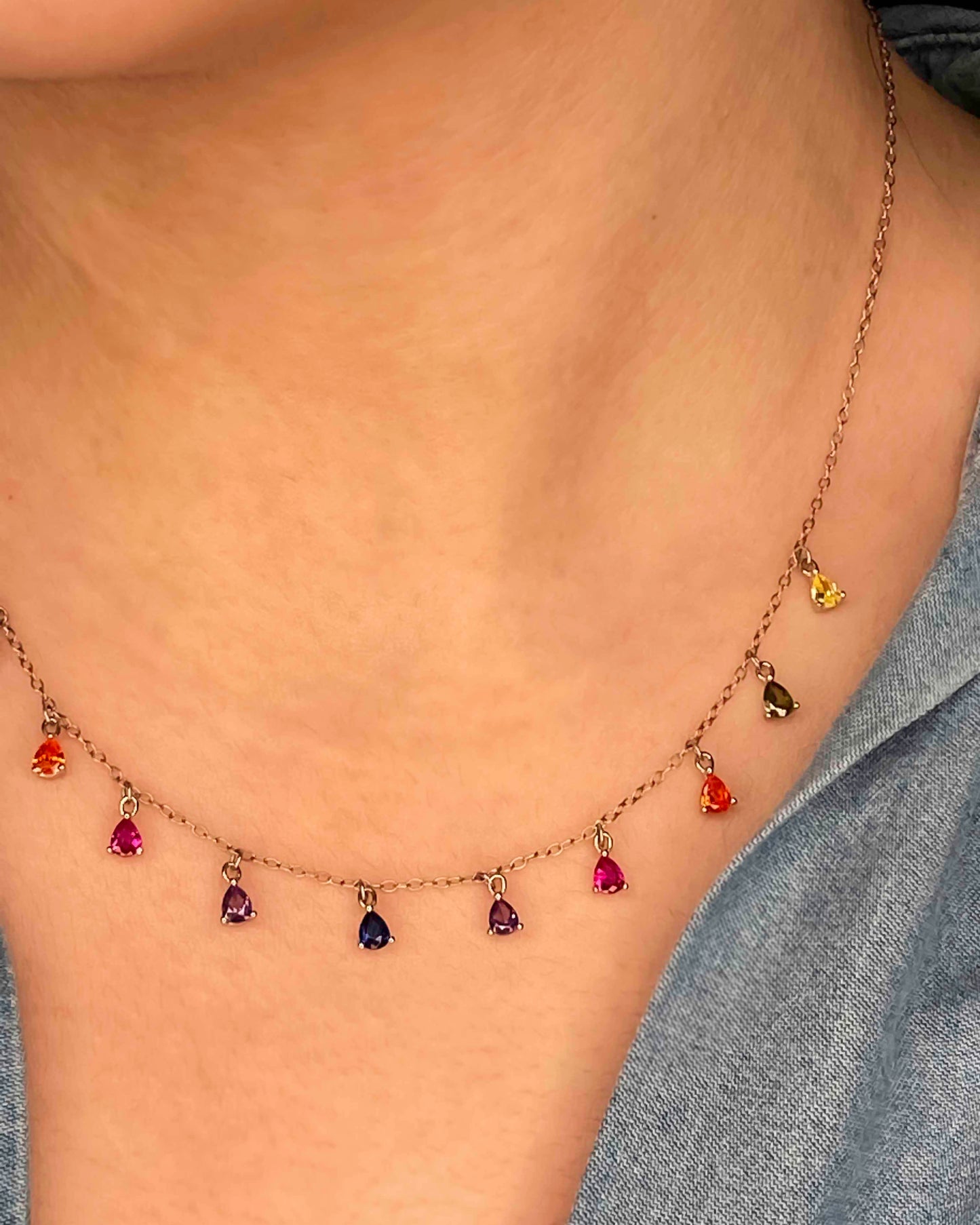 925 sterling silver chain necklace with multicolored zirconia stones.