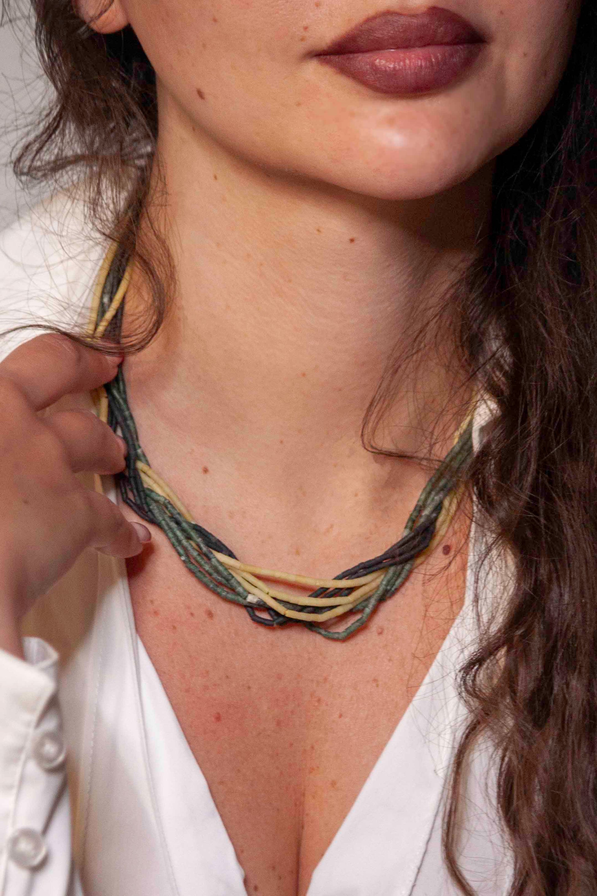 Vintage handmade beaded necklace made using granite stone beads, silver, and lapis lazuli.  