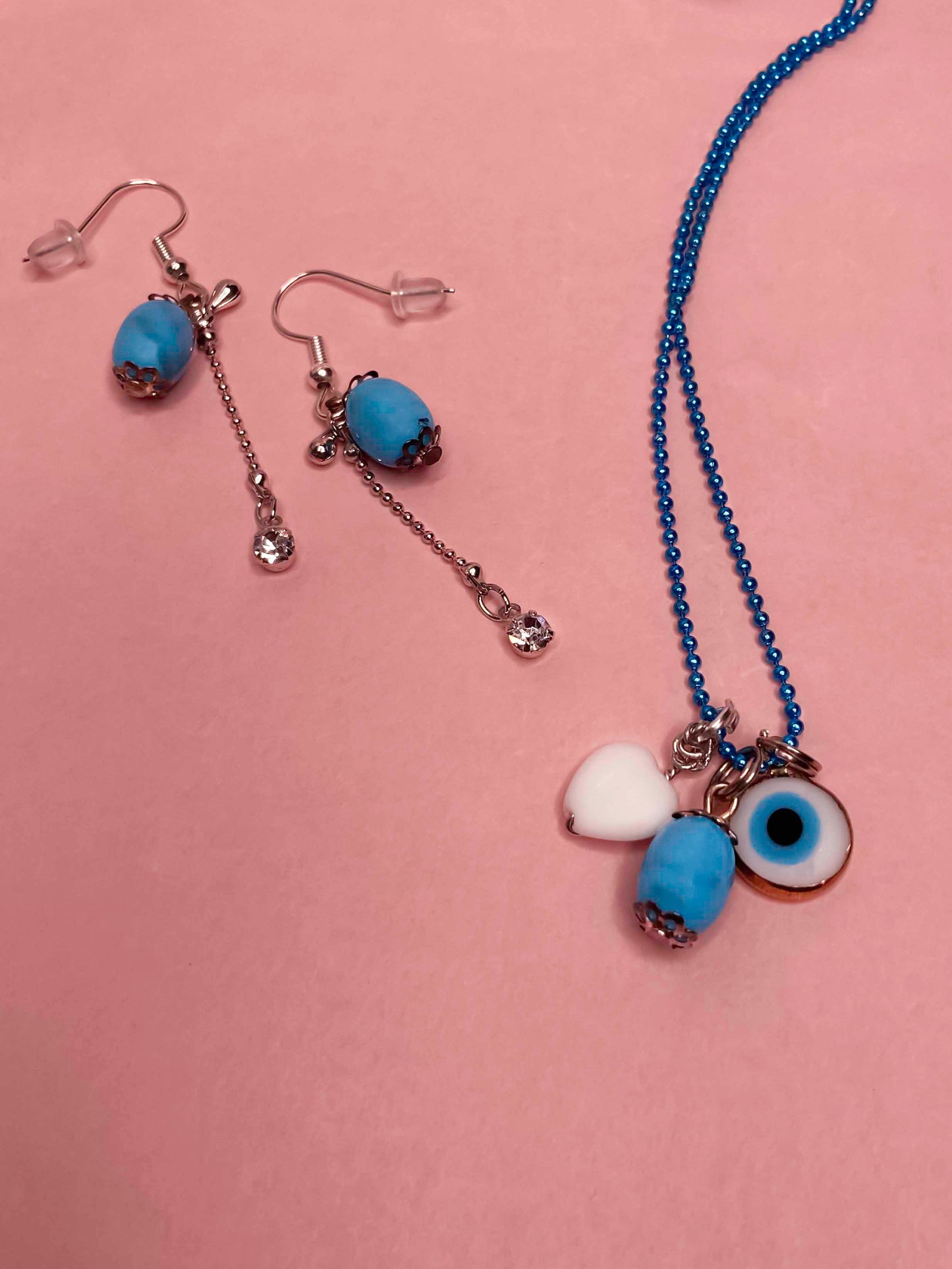 Handmade turquoise stone and evil eye pendant and dangle drop earring set.