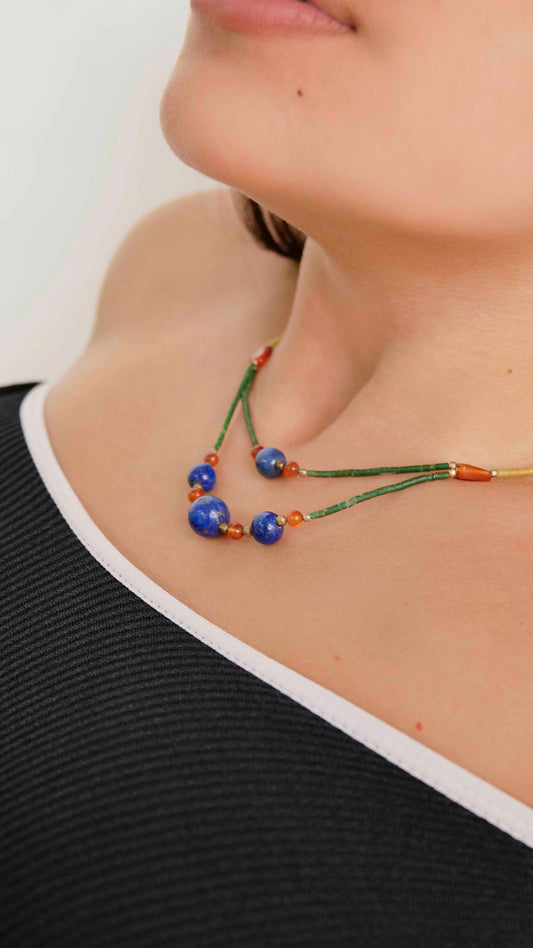 Handcrafted vintage necklace that features granite, carnelian, turquoise and lapis lazuli stones with 925 sterling silver balls and clasp.