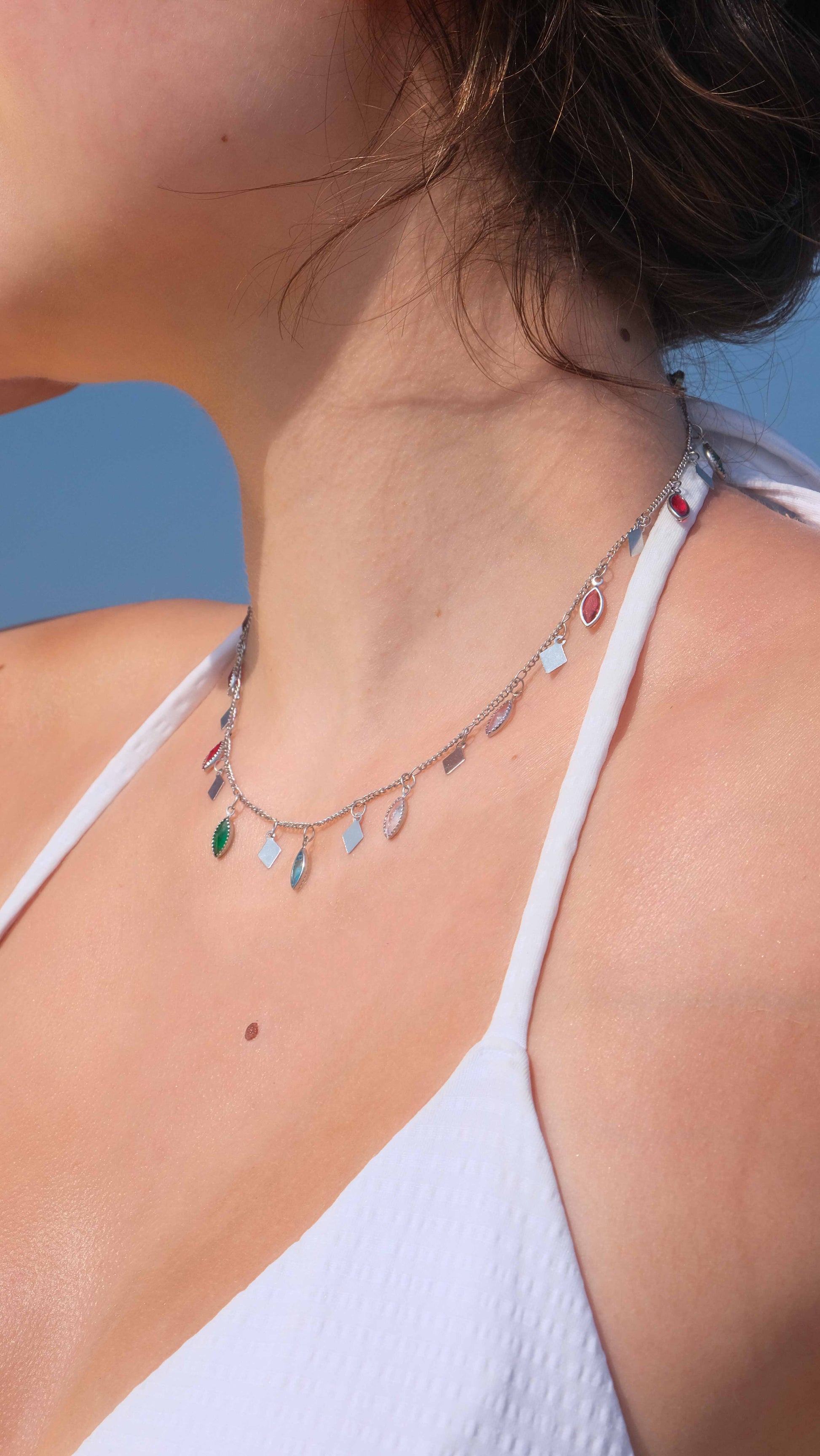 Silver choker necklace for women featuring colorful glass leaf charms, a unique piece of silver plated jewelry and summer jewelry.