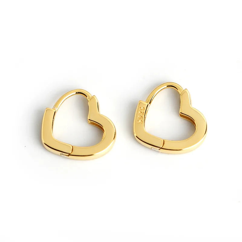 Gold-plated 925 sterling silver heart hoop earrings.