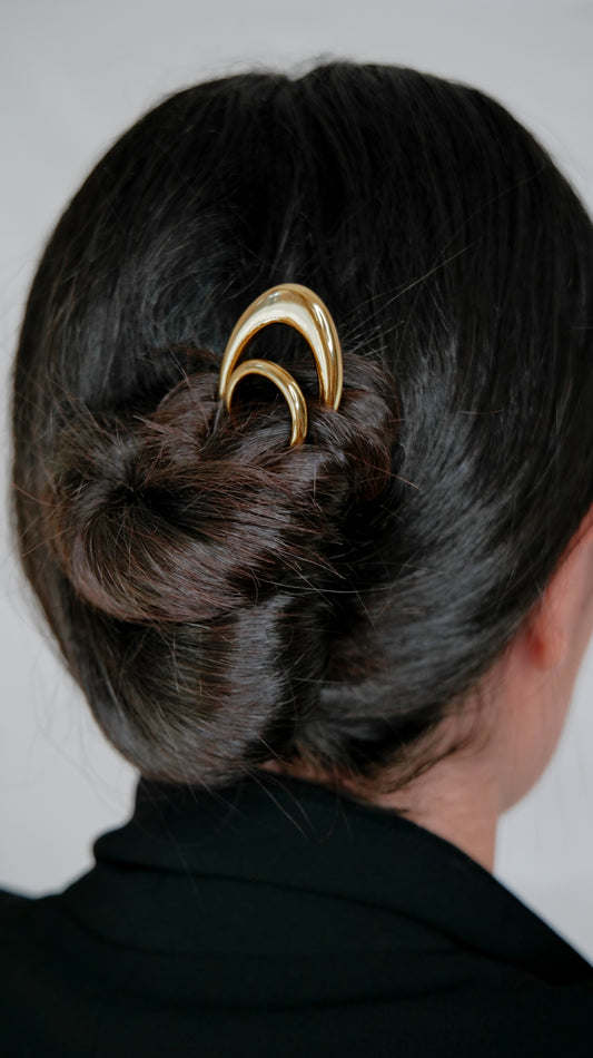 Sleek geometric hairpin styled in minimalist look, contemporary jewelry accessory