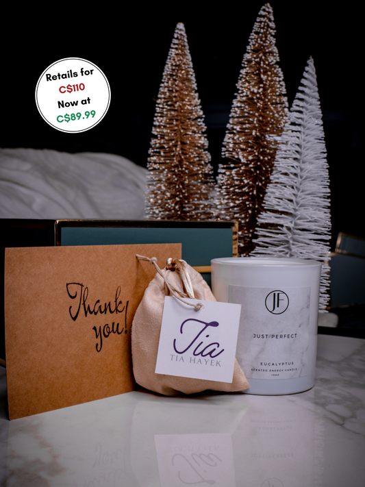 Holiday Gift Box includes a gold-plated sterling silver zirconia stone chain necklace, and a hand-poured soy-wax eucalyptus essential oil scented candle.