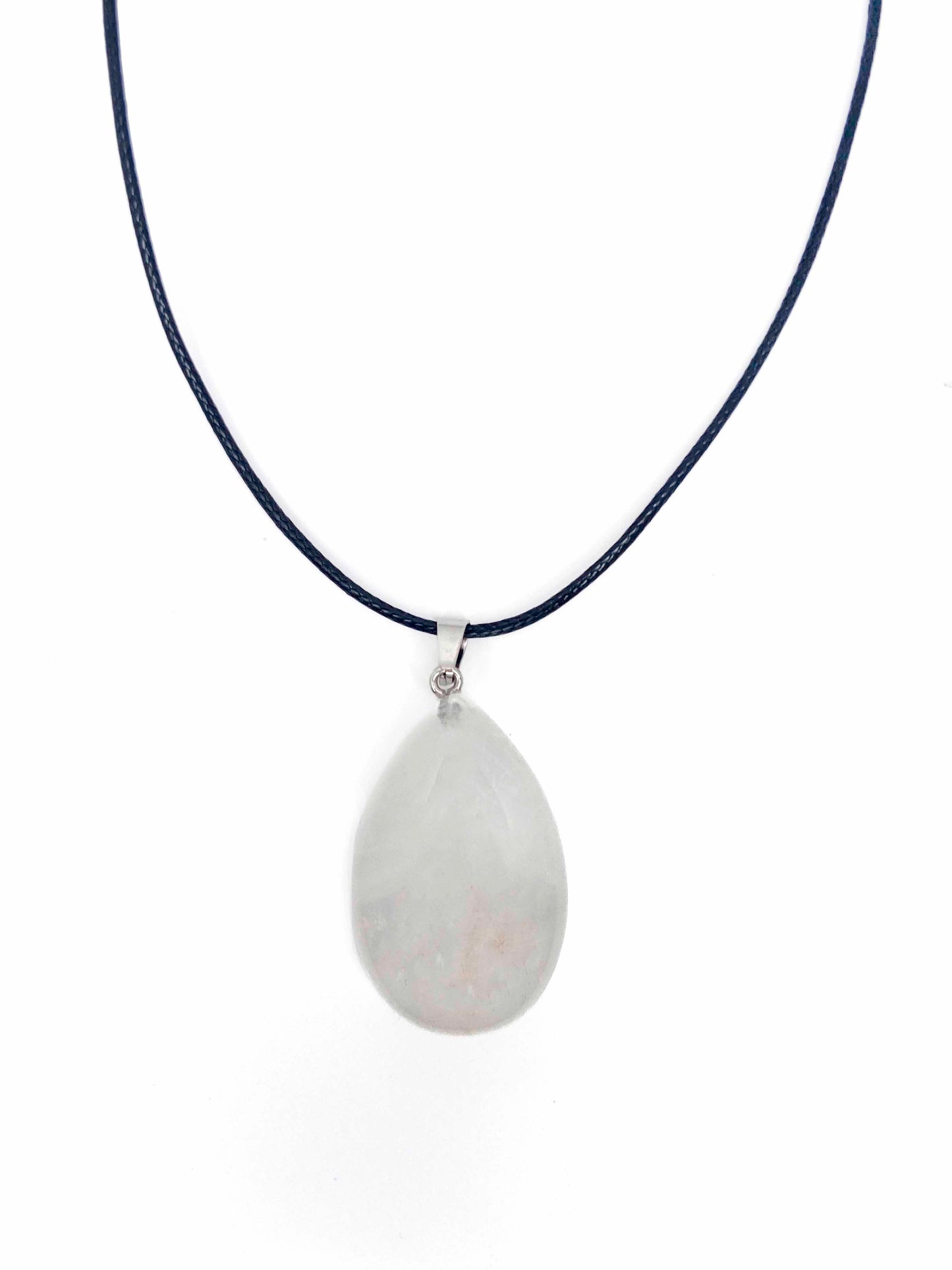 A handmade white jade teardrop pendant necklace with a black vegan leather string.