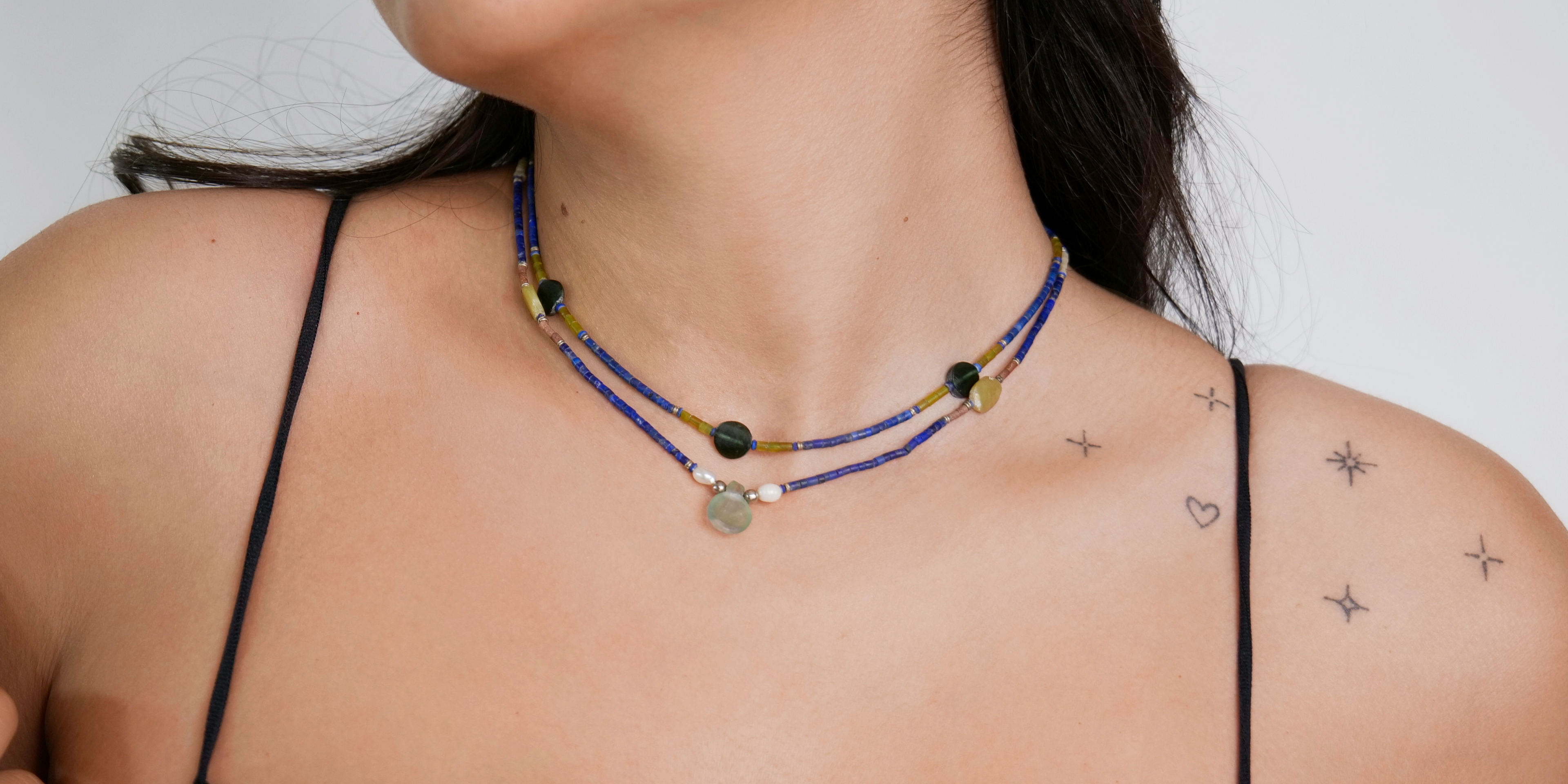 Layered vintage lapis lazuli gemstone necklaces.  
