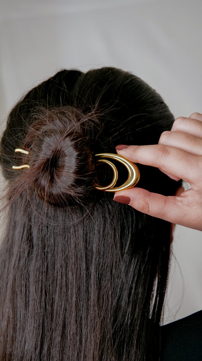 Sleek geometric hairpin styled in minimalist look, contemporary jewelry accessory