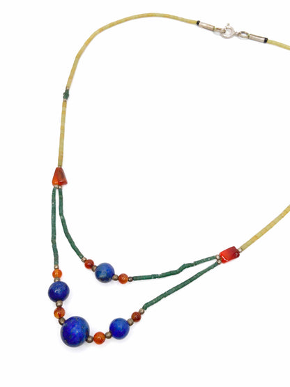 Handcrafted vintage necklace that features granite, carnelian, turquoise and lapis lazuli stones with 925 sterling silver balls and clasp.