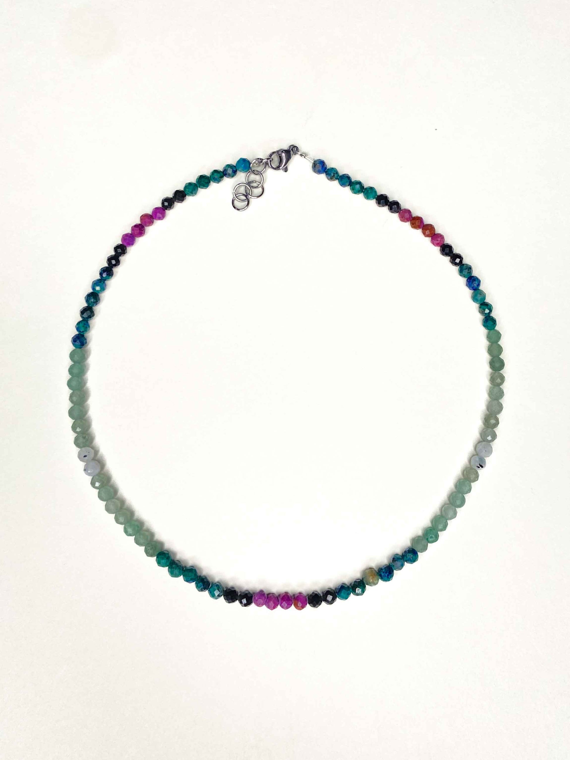 Handmade beaded green and purple mixed gemstone necklace with a sterling silver clasp.
