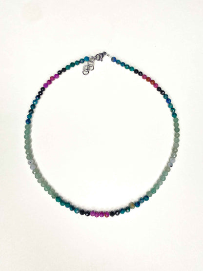 Handmade beaded green and purple mixed gemstone necklace with a sterling silver clasp.