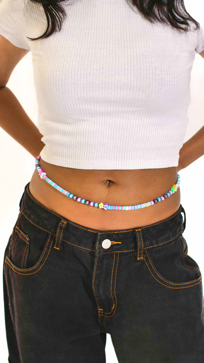 Handmade beaded belly chain made using multicolor flat rubber beads, flower and butterfly charms, and Discoball-like beads.