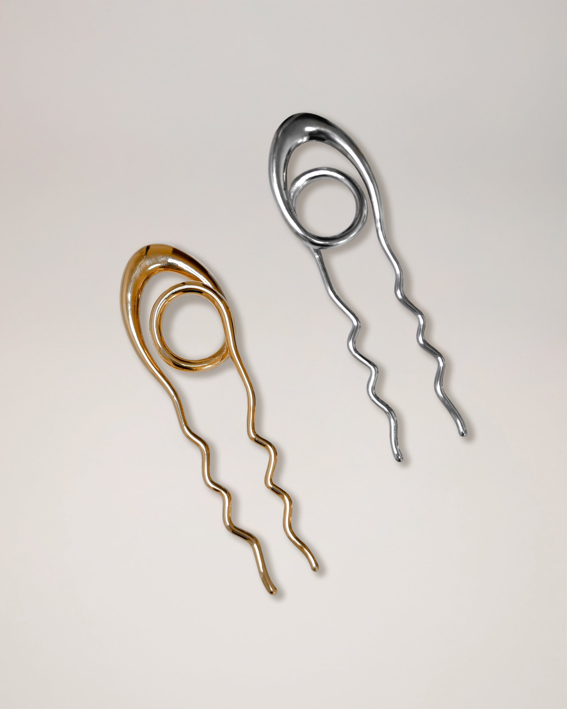 Sleek geometric hairpin styled in minimalist look, contemporary jewelry hair accessory