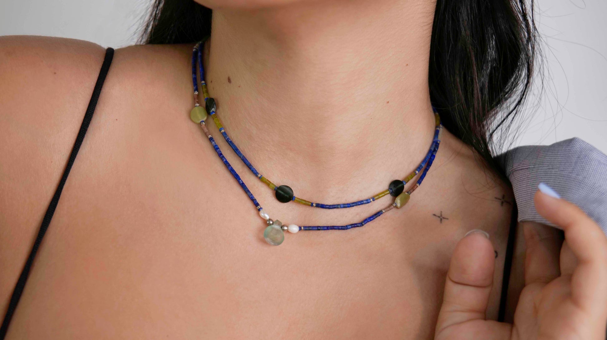 Handcrafted vintage necklaces that feature green quartz, pearls, granite, black tourmaline, and lapis lazuli stones with 925 sterling silver balls and clasp.