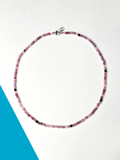 Handmade beaded pink tourmaline stone necklace with a sterling silver clasp.