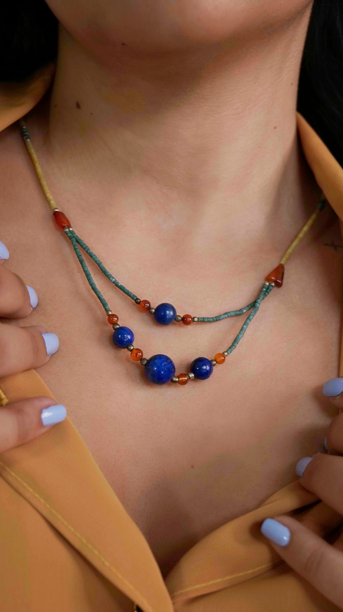 Handcrafted vintage necklace that features granite, carnelian, turquoise and lapis lazuli stones with 925 sterling silver balls and clasp.