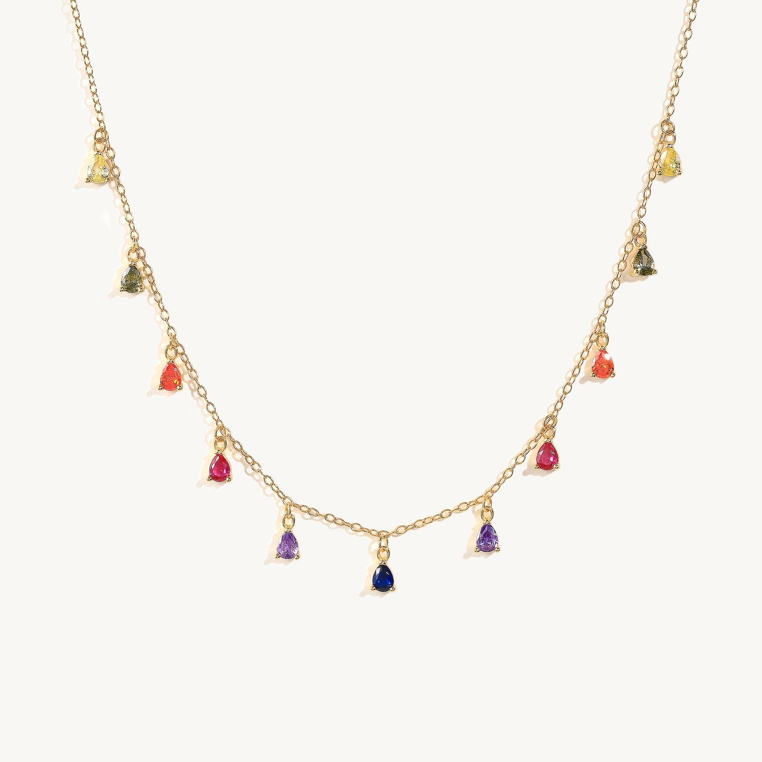 A gold-plated sterling silver zirconia stone chain necklace.