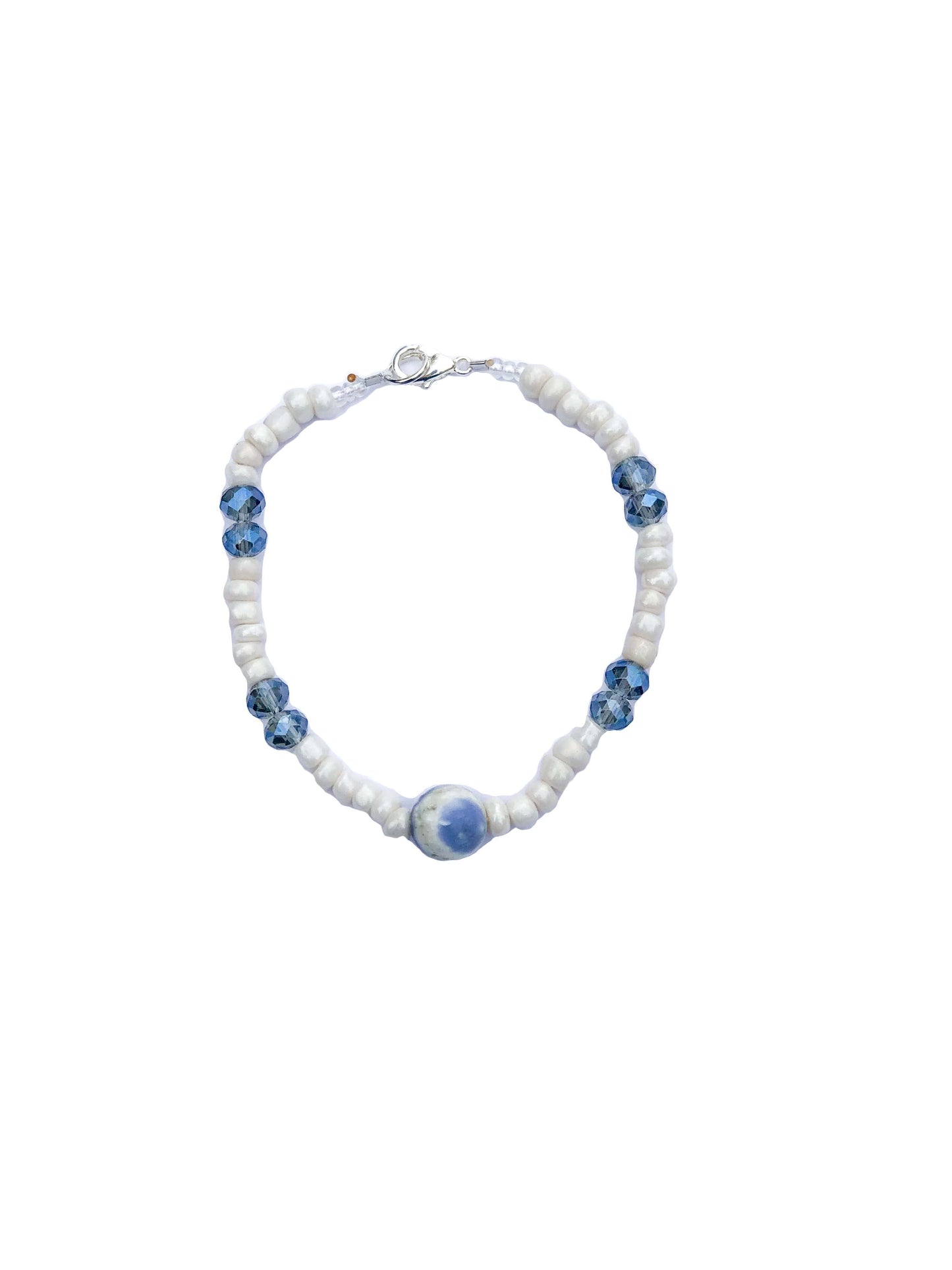 white and blue crystal beads bracelet with a marble like center piece