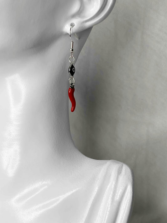 Handcrafted pair of earrings made using evil eye charms and red chili pepper charms.