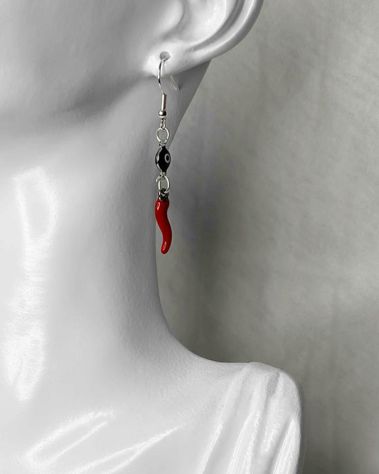 Handcrafted pair of earrings made using evil eye charms and red chili pepper charms.