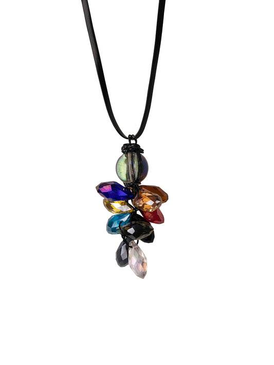 handcrafted wire wrapped crystal necklace made using multicolored teardrop crystal beads with a glass ball bead on top.