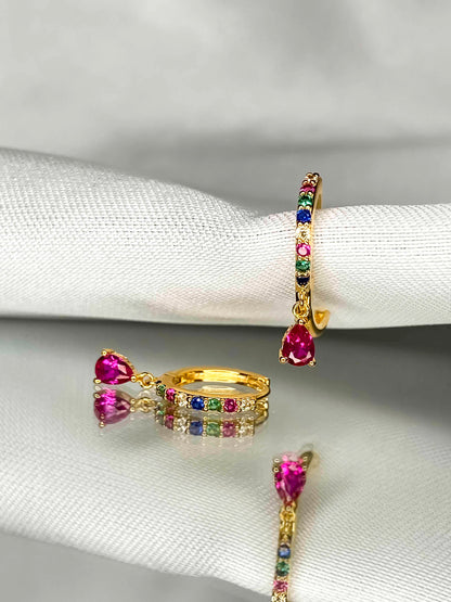 925 gold-plated sterling silver huggie hoop earrings with multicolored zirconia stones.