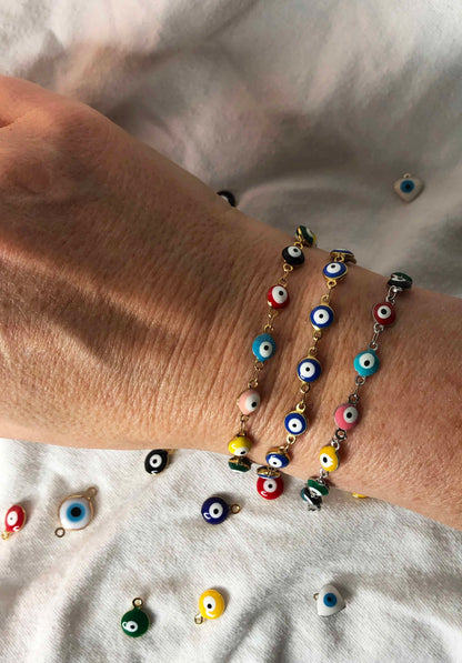 multicolored evil eye charms handcrafted into a chain bracelet