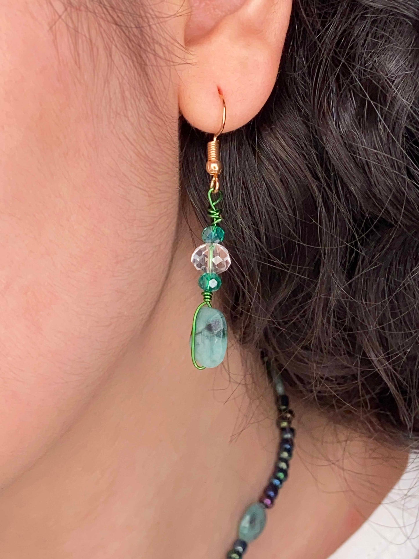 handmade wire wrapped emerald earrings with crystal beads.