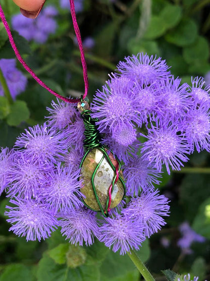 handcrafted green and pink wire wrapped jade pendant necklace with adjustable sliding knot ties.