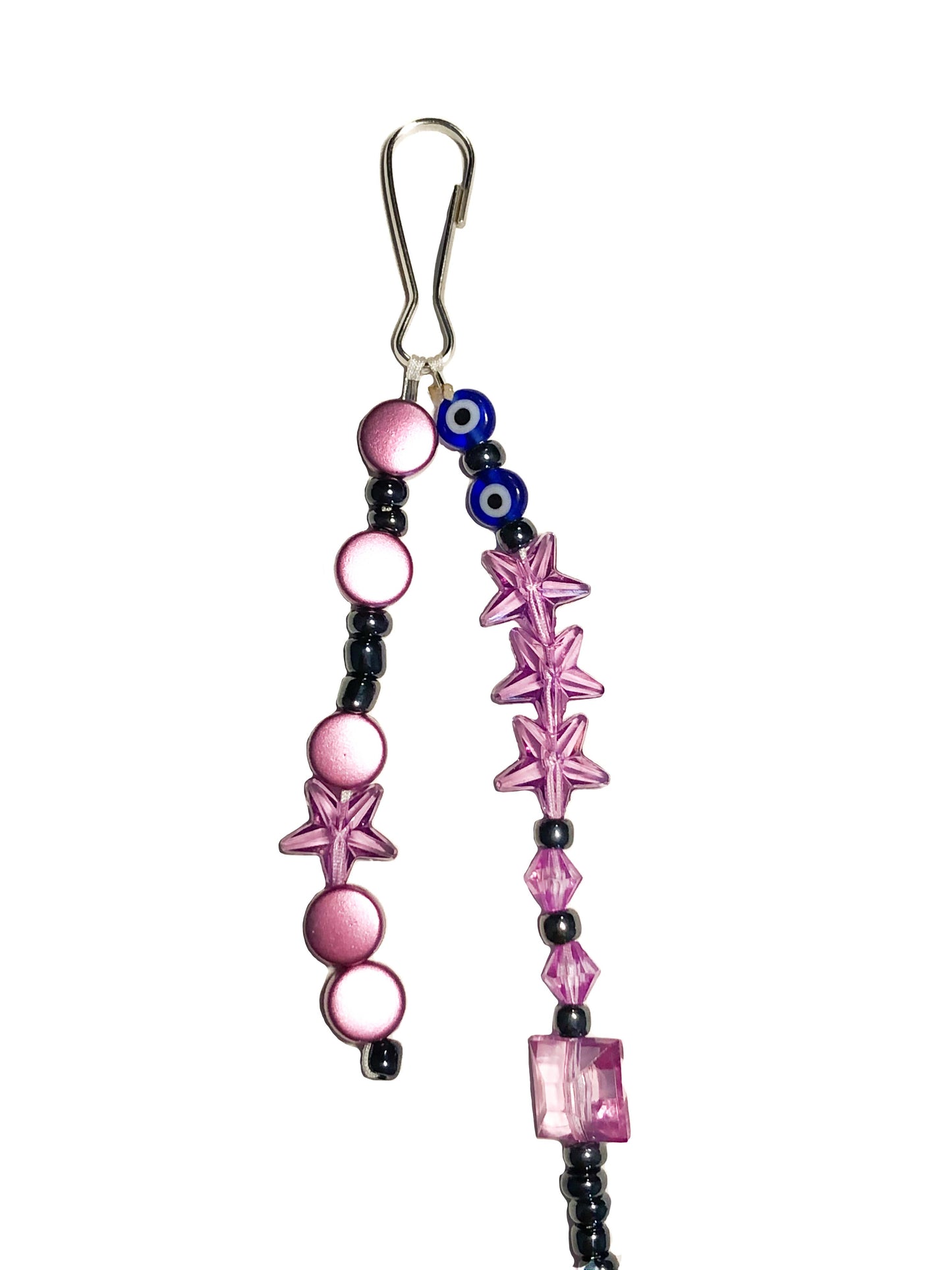 Pink and black beaded bag charm with a ball and evil eye charms.