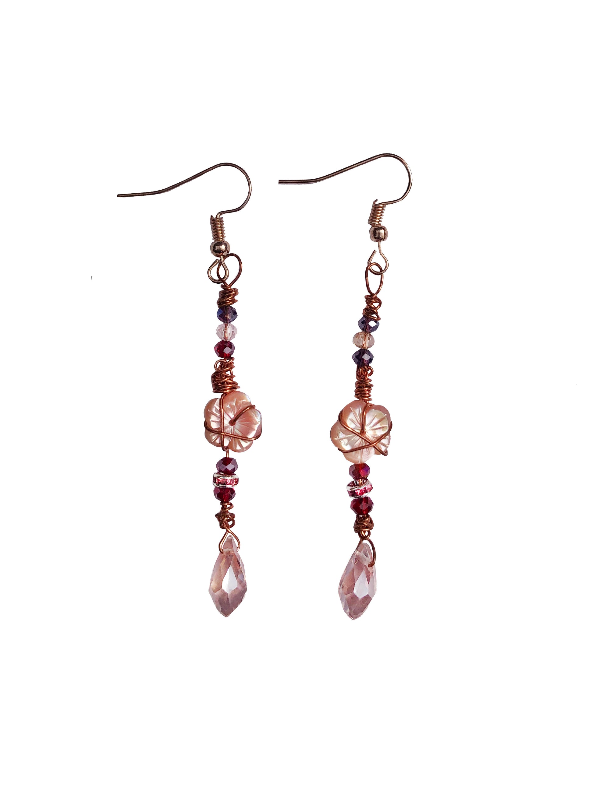 A pair of handmade wire wrapped beaded crystal and flower pearl charm earrings.