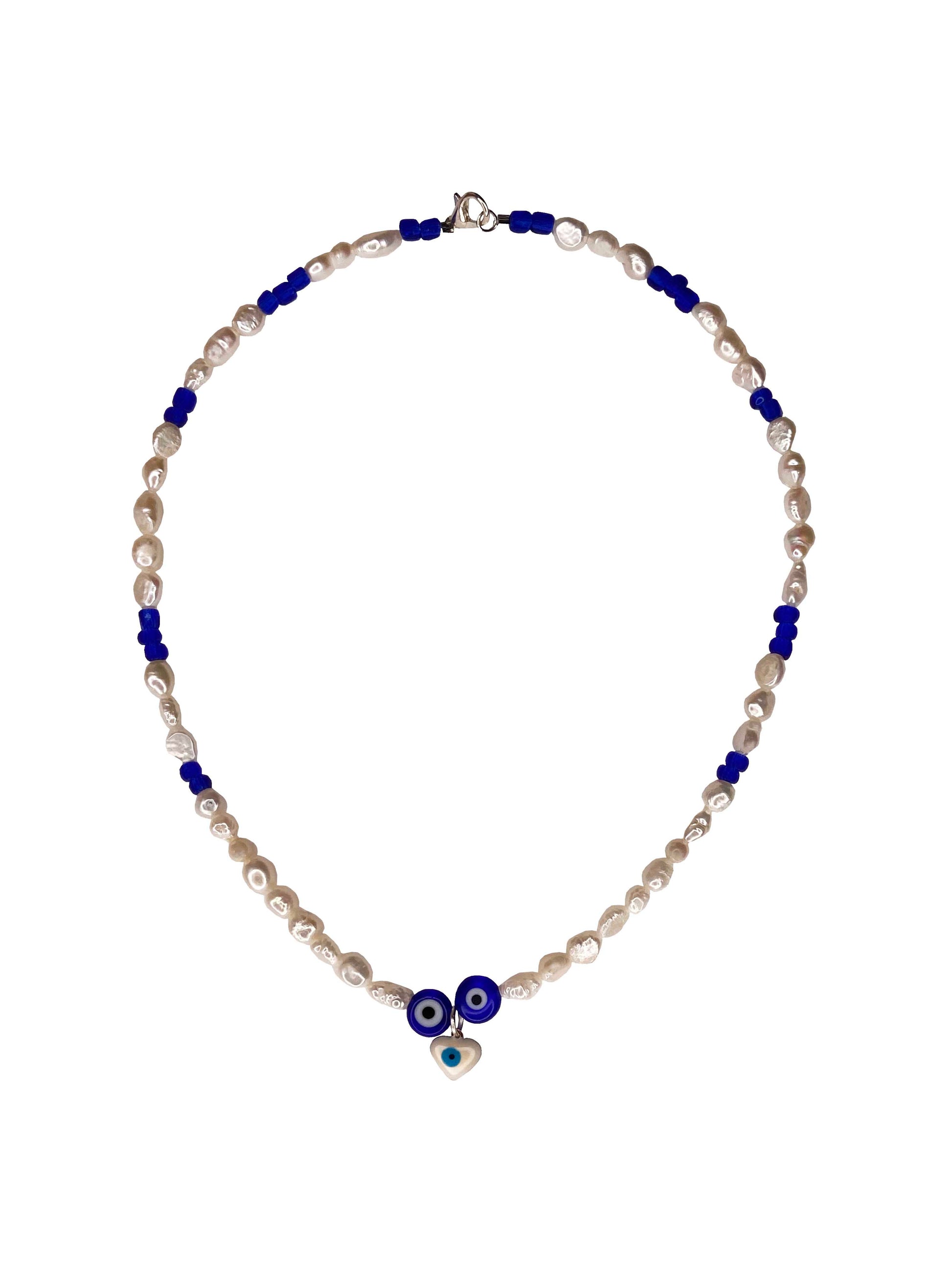 Handmade freshwater pearl & glass beaded necklace with a blue nazar amulet, and white evil eye charm.