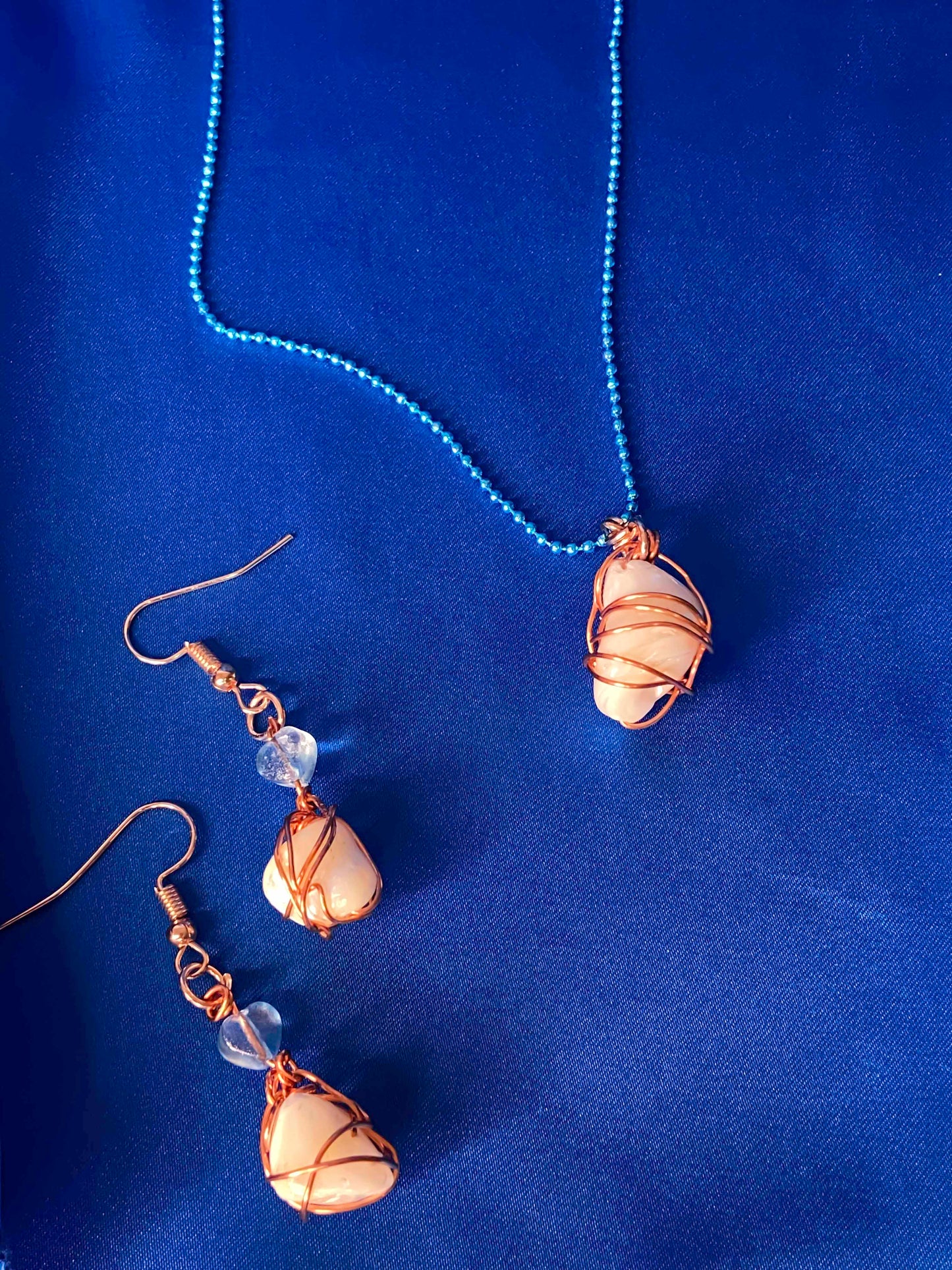 Handmade copper wire wrapped large freshwater pearl necklace and earrings set.