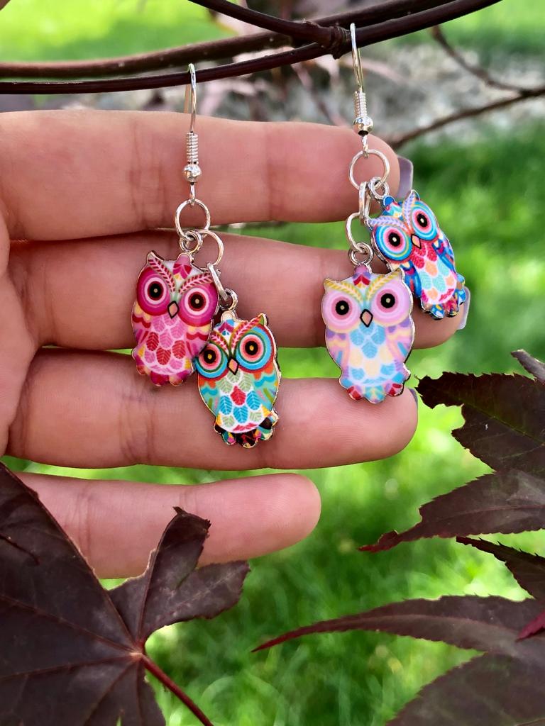 handcrafted silver chain link earrings with colorful owl charms .