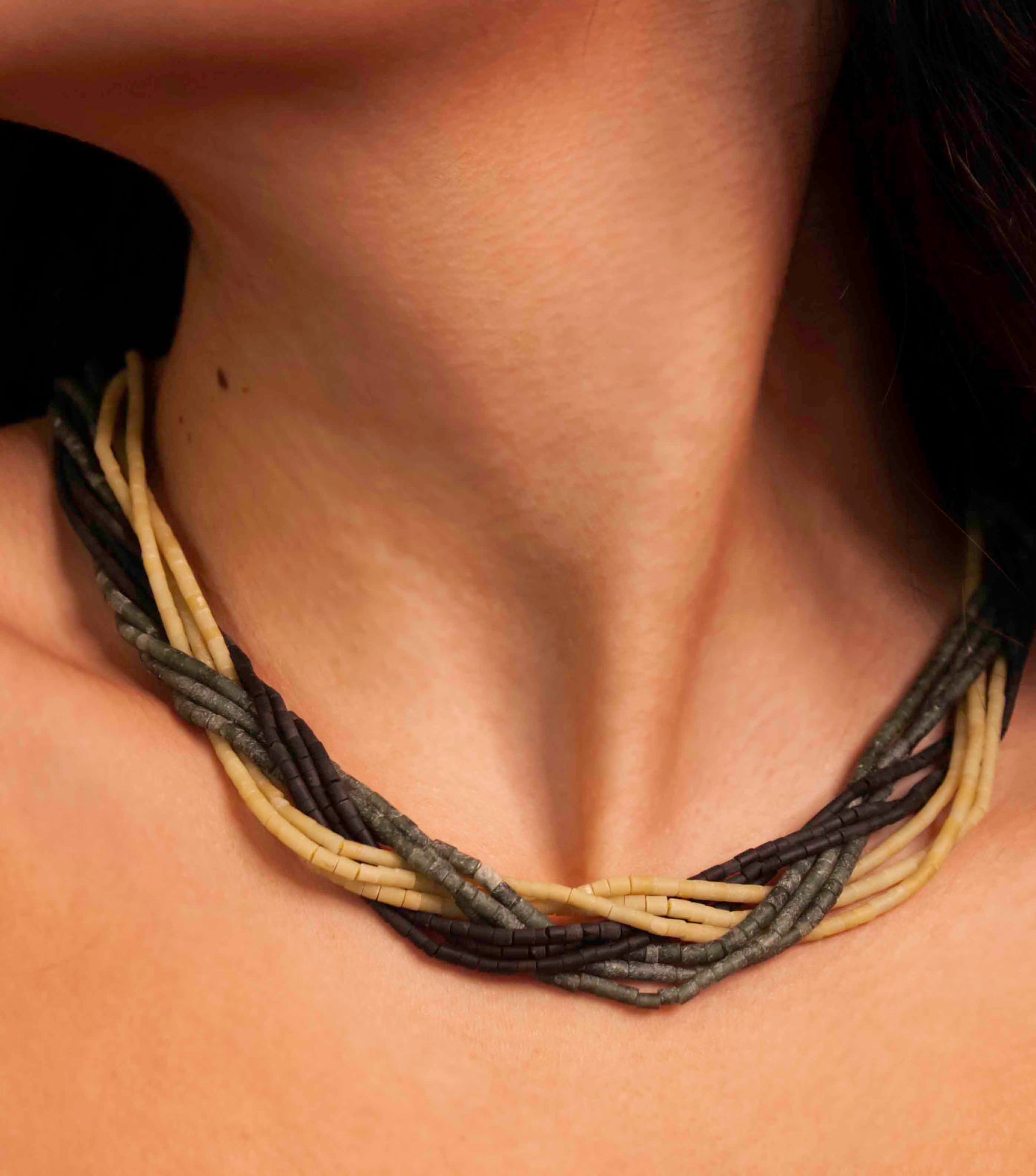Vintage handmade beaded necklace made using granite stone beads, silver, and lapis lazuli.