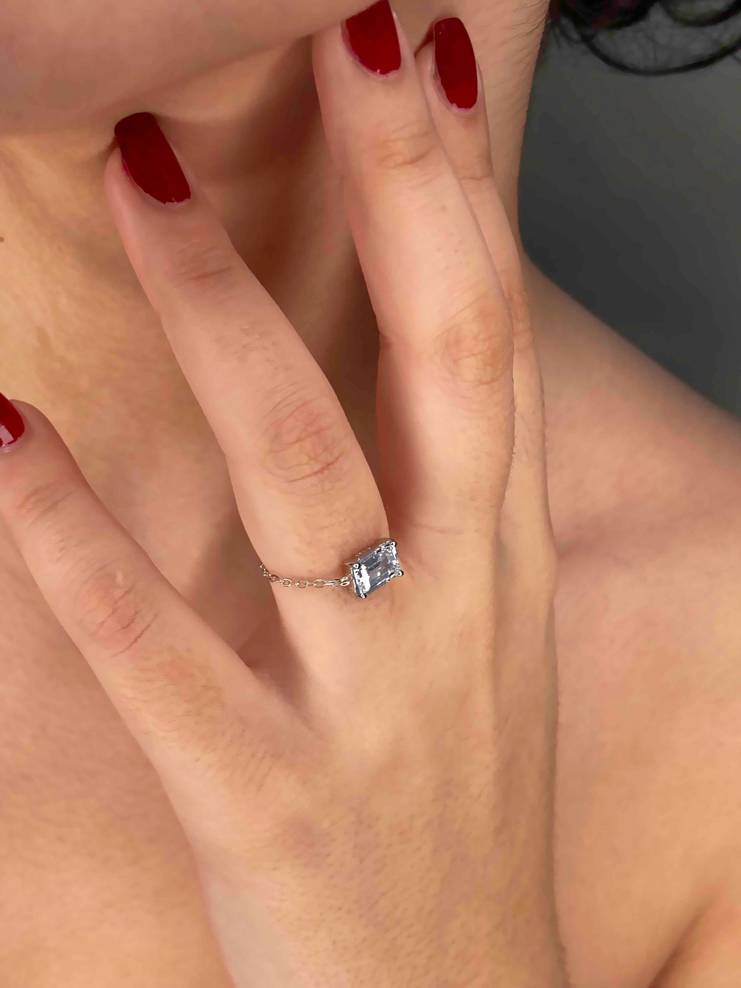 Handcrafted adjustable 925 sterling silver rectangle cubic zirconia ring. 